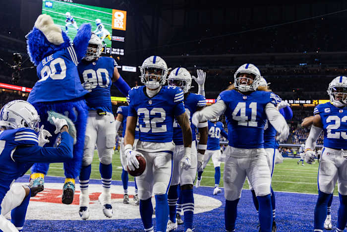 Dec 16, 2023; Indianapolis, Indiana, USA; Indianapolis Colts safety Julian Blackmon (32) celebrates his interception with teammates in the second half against the Pittsburgh Steelers at Lucas Oil Stadium.